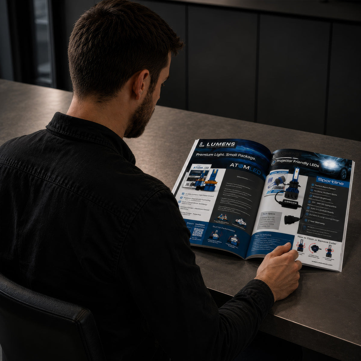 Person viewing LUMENS HPL catalogue